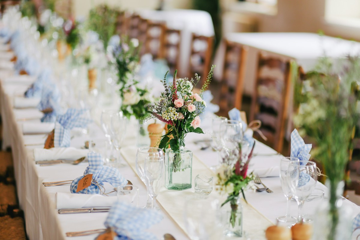 Intimate wedding table with flowers and candlelight
